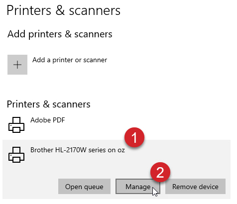 Select the printer in the Printers and scanners screen and press the Manage button.